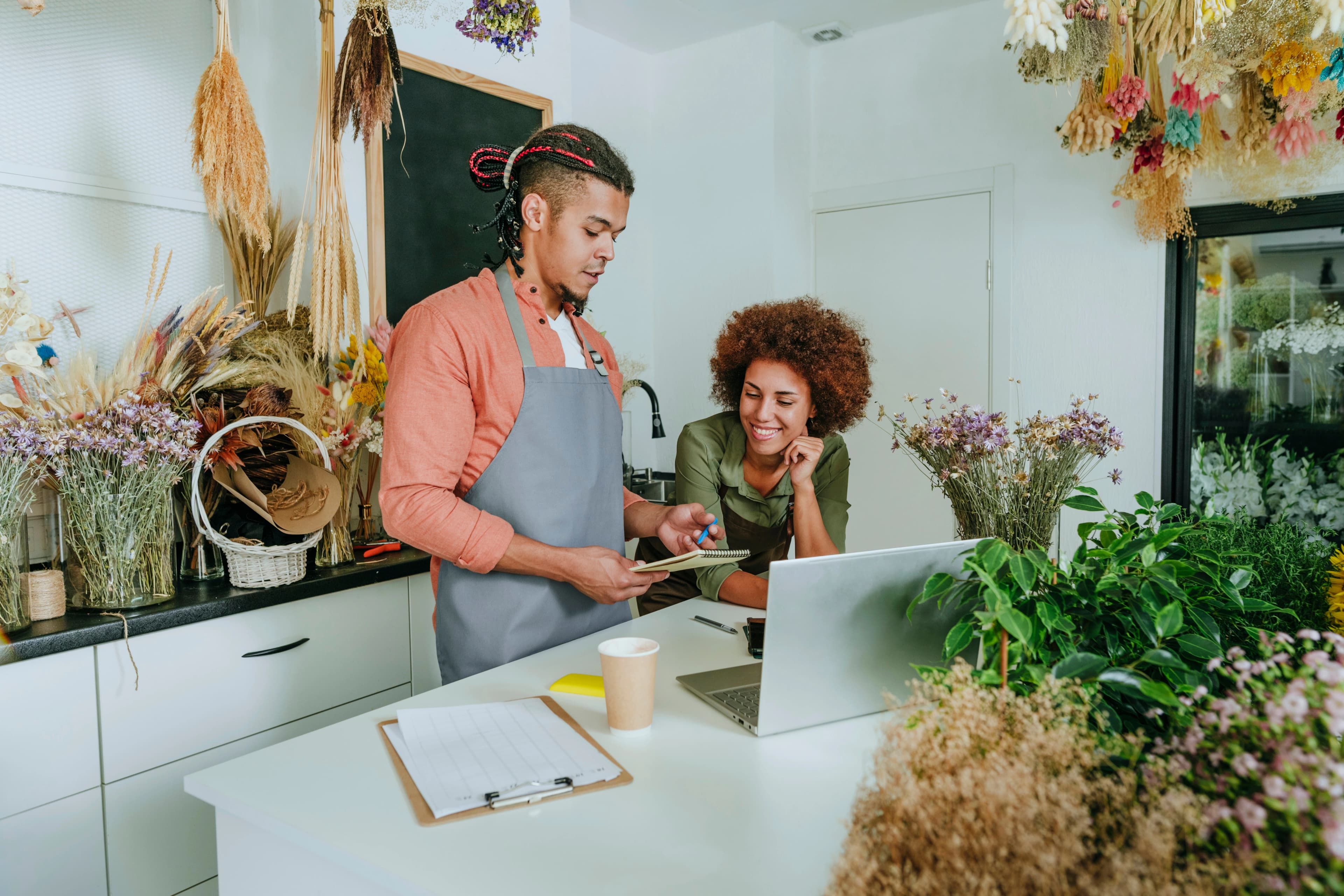 Man and woman working in cafe